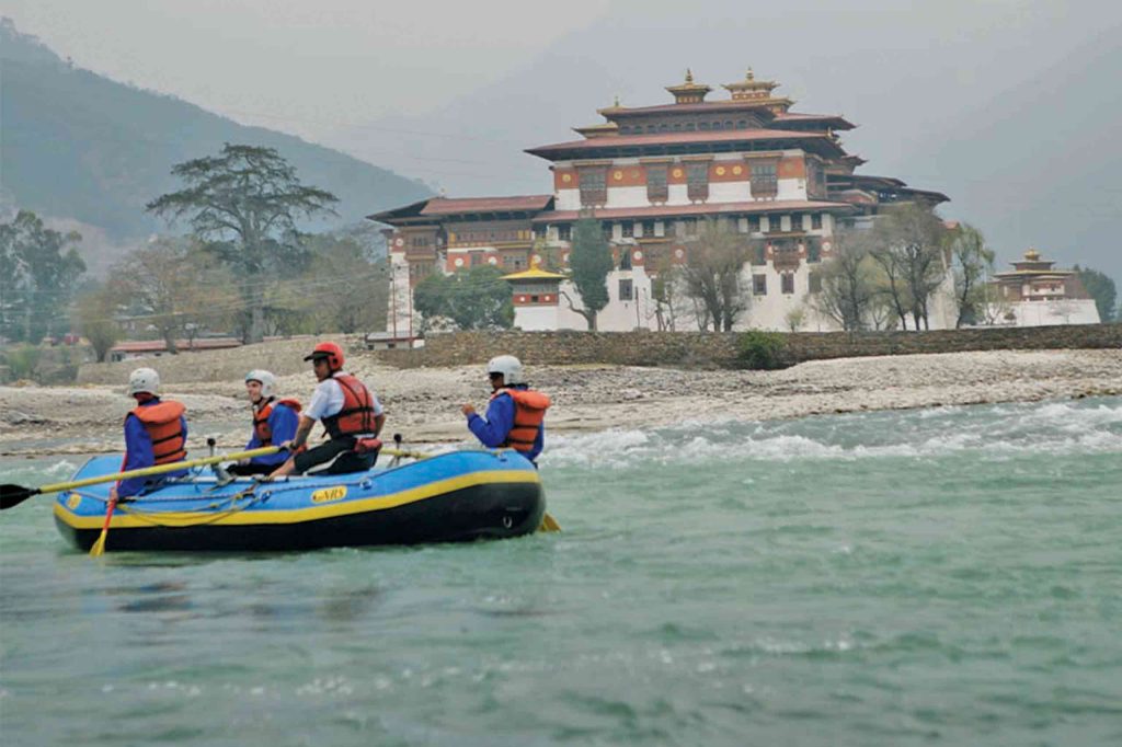 A solitary Monk Travels River rafting